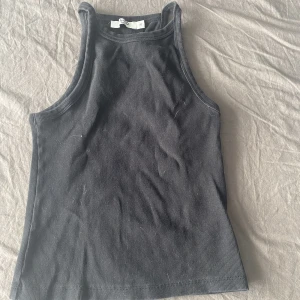 Svartlinne  - Svart topp i bra skick 