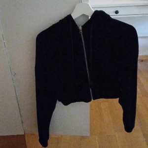 Svart mjukis jacka - Svart mjukis jacka