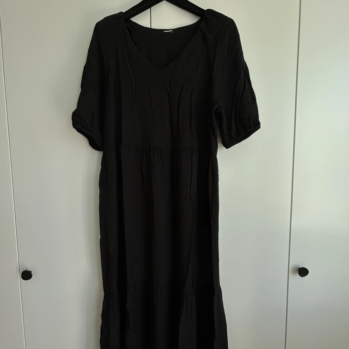 Black midi dress with v-neck