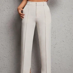 Ljusa kostymbyxor - PETITE - Ljusa kostymbyxor i storlek xs - petite. Helt oanvända. 