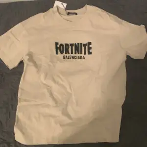 Beige Fortnite x Balenziaga t-shirt.