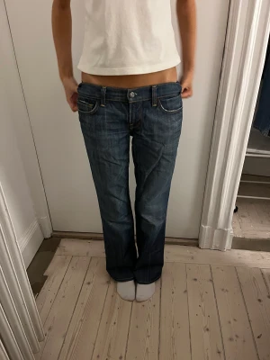 Lågmidjade jeans  - Mörkblåa lågmidjans vintage jeans 