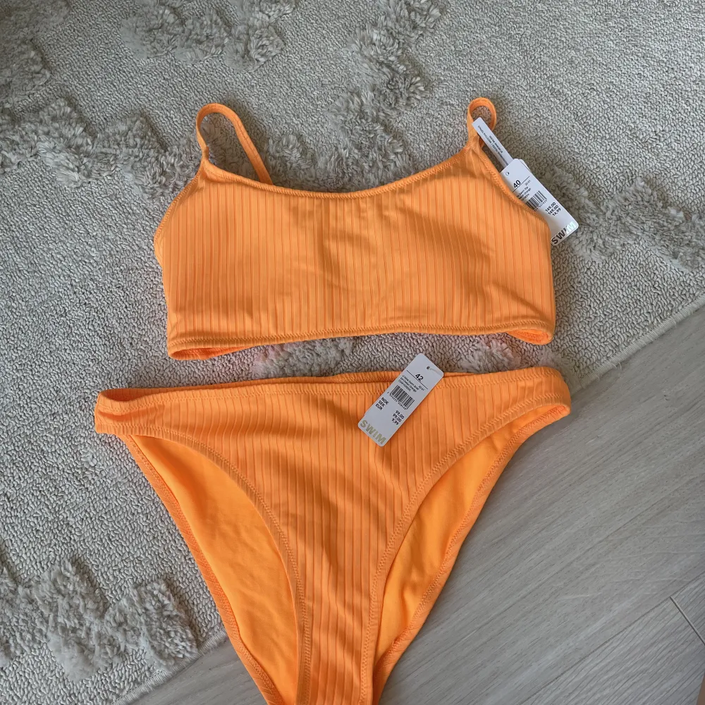 Helt oanvänd bikini från Cubus i härlig orange färg!🧡. Övrigt.