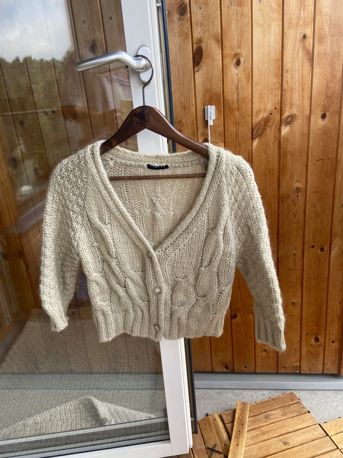 Stickad trekvartsärm 