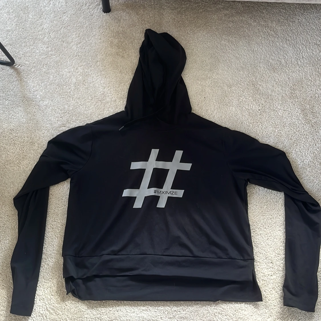 Tunn träningströja med luva