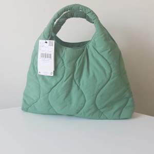 Green new bag from Mango with tags on. Never used 