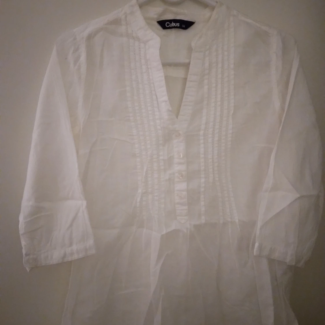 Vit blus med stråveck. Vintage look. Strlk 34 / XS-SMALL. 