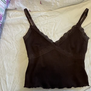 Brun topp - BUDGIVNING FRAM TILL SÖNDAG! Brun topp från Hm i storlek XS.