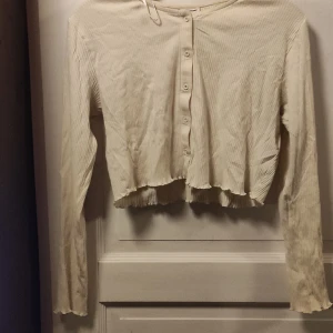 Vit kofta - Naturvit croppad kofta.