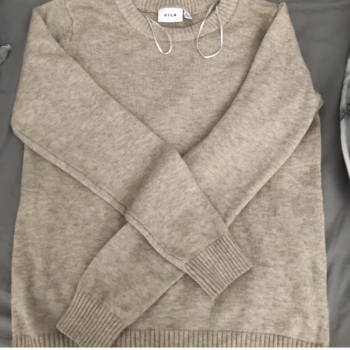 Beige stickad tröja 