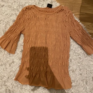 Topp  - Snugg topp använd endast engång!