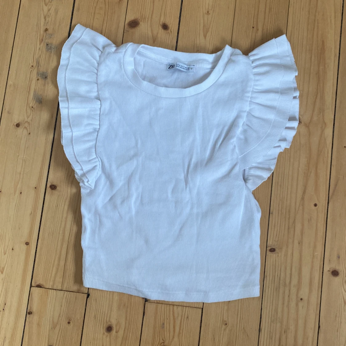 Zara topp med volang - 90