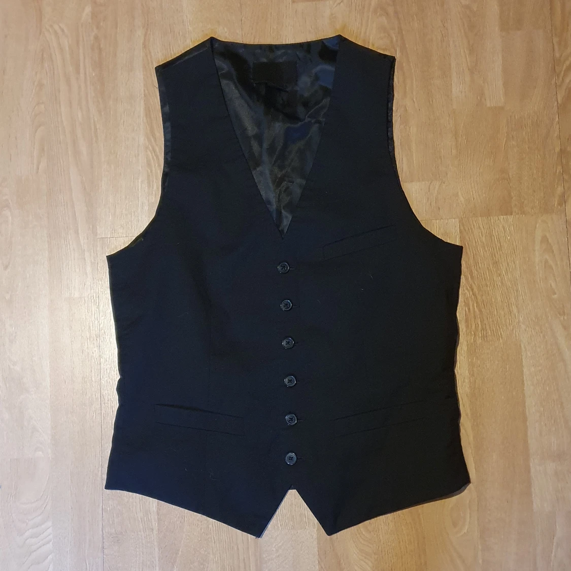 Kostymväst
