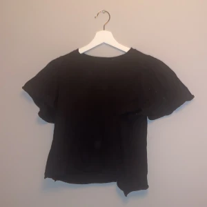 Vart tröja - En svart tröja Storlek xs