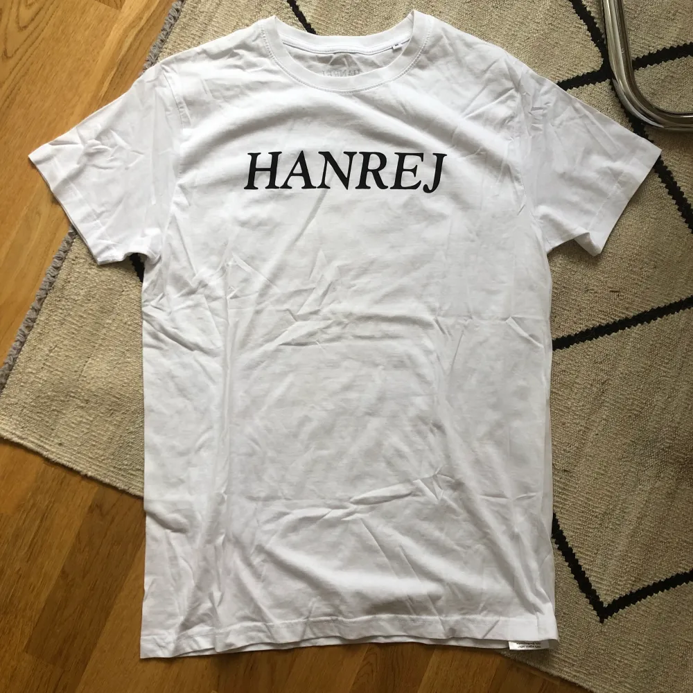 HANREJ Tee Size M (fits L) Unworn. T-shirts.