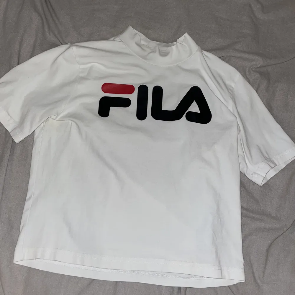 T shirt från Fila, storlek L. Fint skick. . T-shirts.