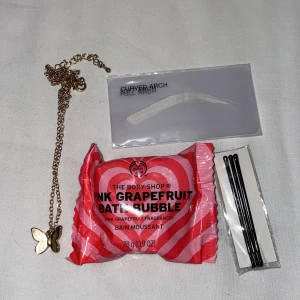 Skönhets kitt - En badbomb ett guld halsband 3 hårnålar och ögonbryns former