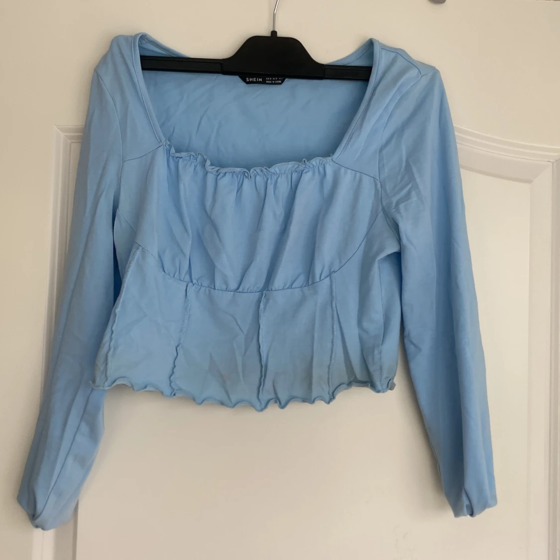 Magtröja i ljusblå 