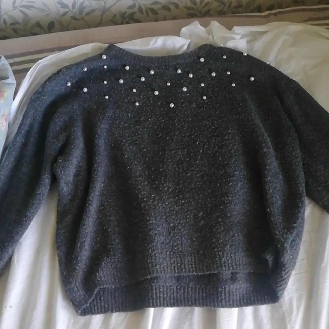 En tröja med pärlor