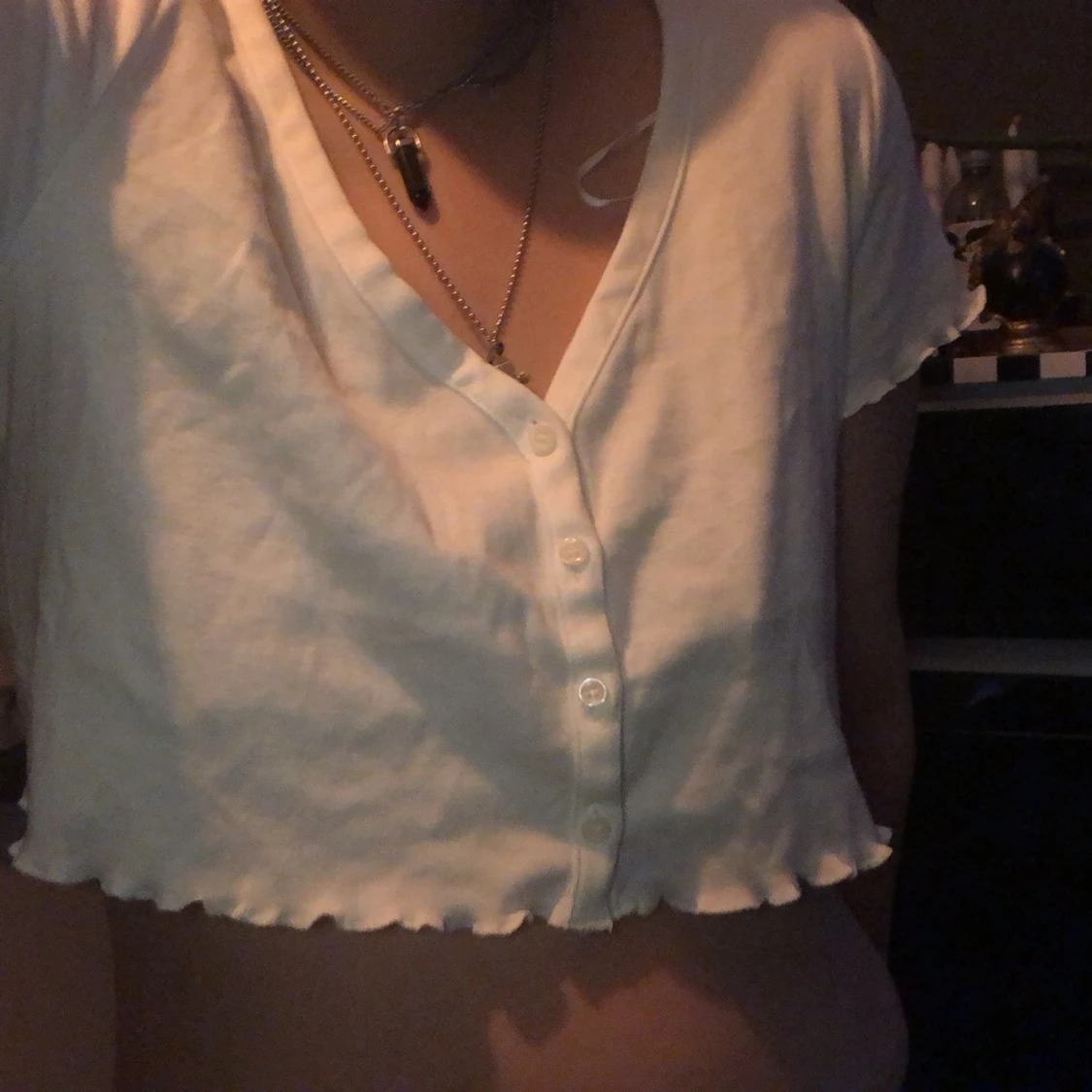 H&M kroppad topp med urringning  - 90