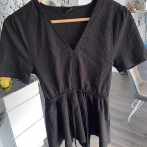 Topp strukturerat tyg - Köpt på Gina för några år sen. Storlek xs 