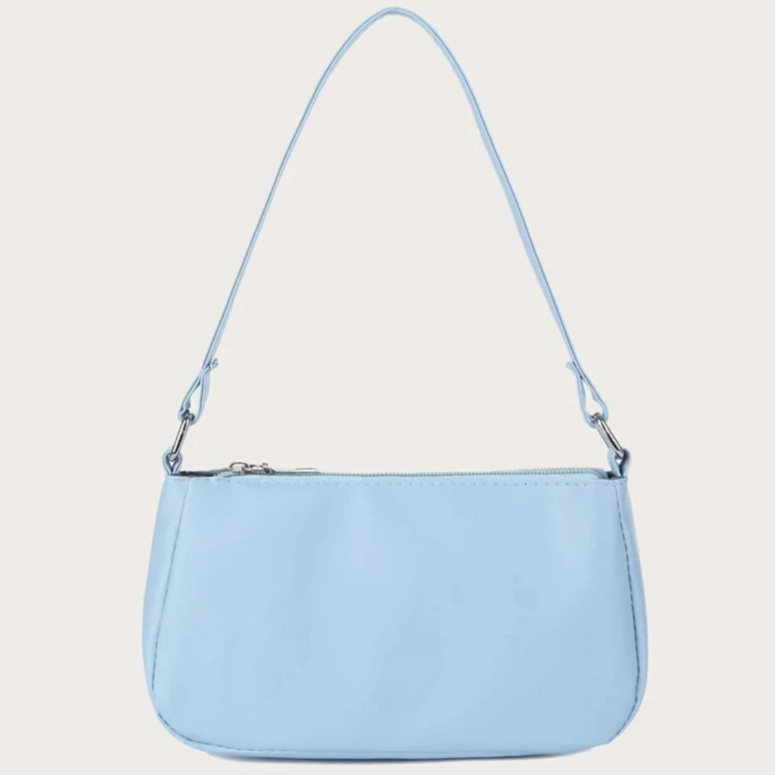 Babyblå axelväska