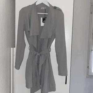 Kappa - Helt ny oanvänd kappa, storlek XS, pris 250kr