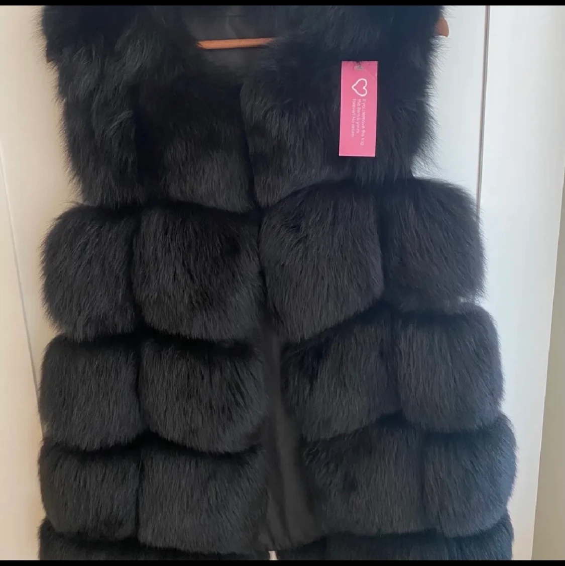 Svart pälsväst (Borninstockholm) s ny