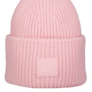 Acne mössa - Intressekonflikt på min rosa acnemössa som jag fick i present. Den är aldrig andvänd då den inte passade mig alls. Så hör av dig om du är intresserad 