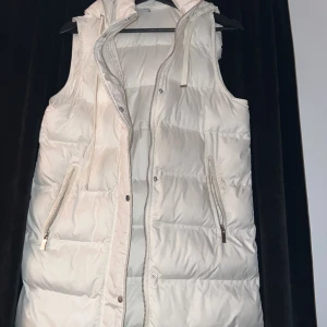 Lång väst - Använd en gång!