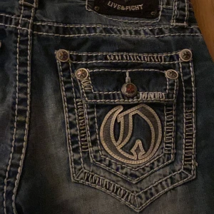 jeans - olimp jeans med tryck köpt på plick men dom passar nt mig så ska sälja vidare