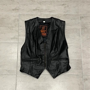 Skinnväst - Svart väst i läder, storlek S Använd några gånger