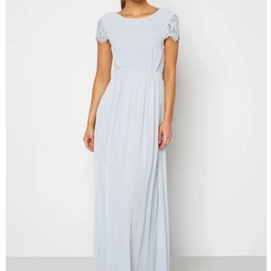 Balklänning - Fin ljusblå balklänning. Endast använd en gång.