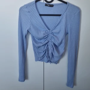 Topp, xxs - Fint skick. Ej använd. Snörning fram.