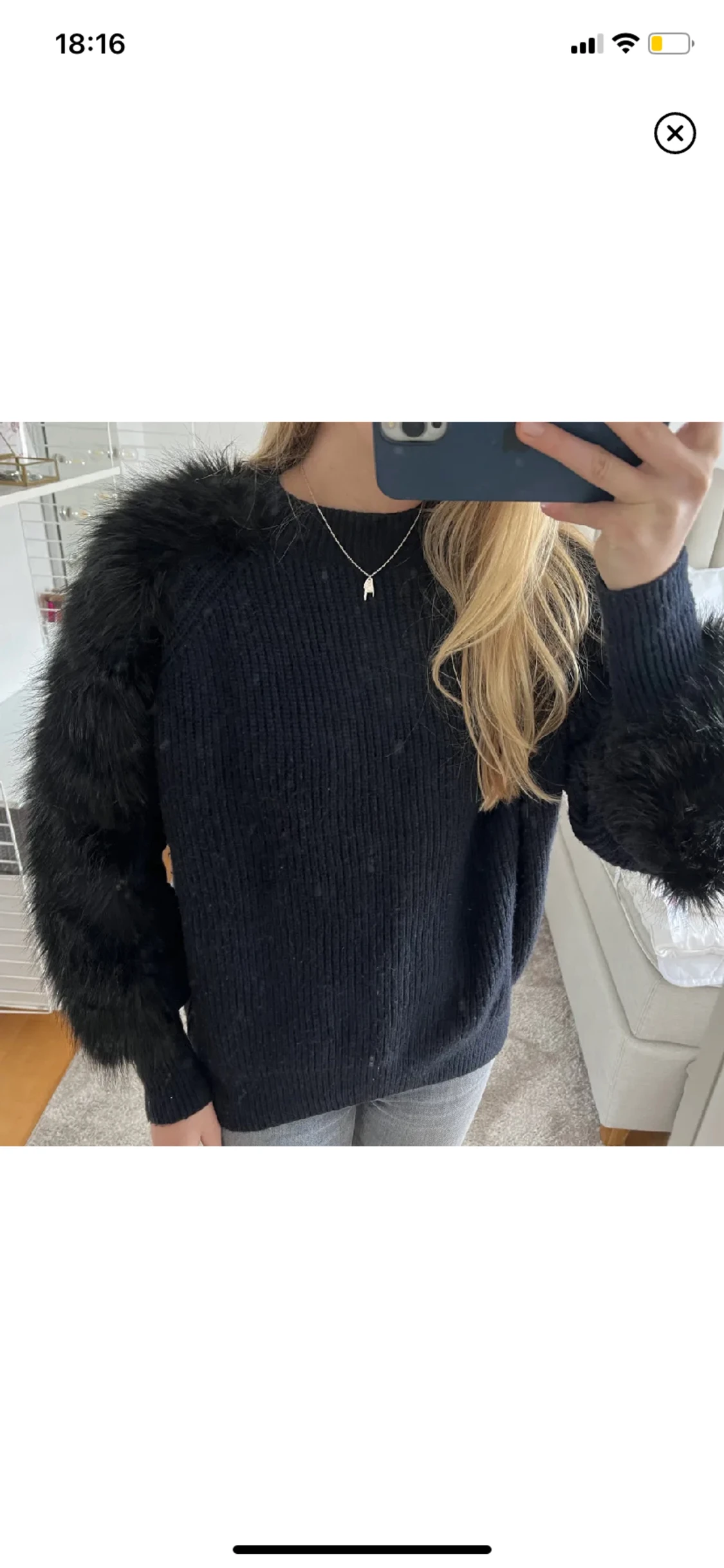 Svart tröja med päls