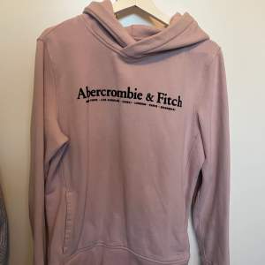 En använd rosa abercrombie & fitch hoodie