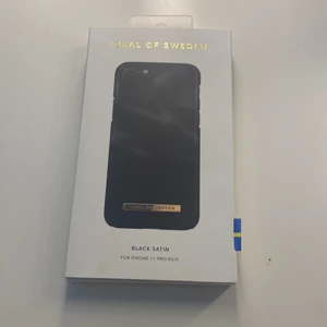 Mobilskal  - Ideal of sweden Black satin. Helt oanvänd med original pris på 400