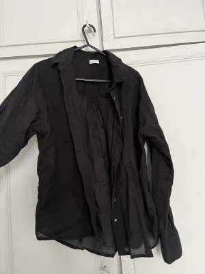 Black shirt with pattern  - Black stylish shirt with descrete pattern. 