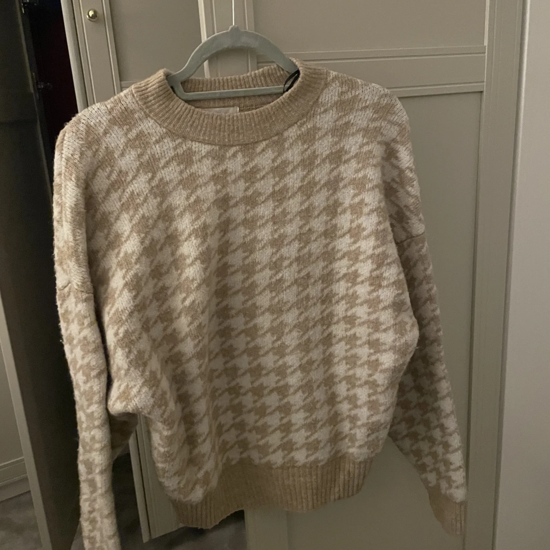 Stickad tröja