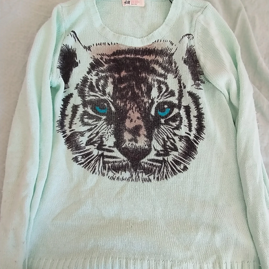 Stickad sweatshirt turkos