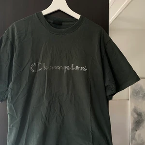 Champion - T-shirt champion. Vintage. Retro. Storlek L. 