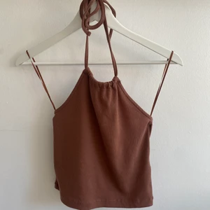 Halterneck  - Aldrig använd, köparen står för frakt