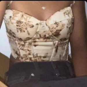Korsett - Corset top med blommor. Storlek S