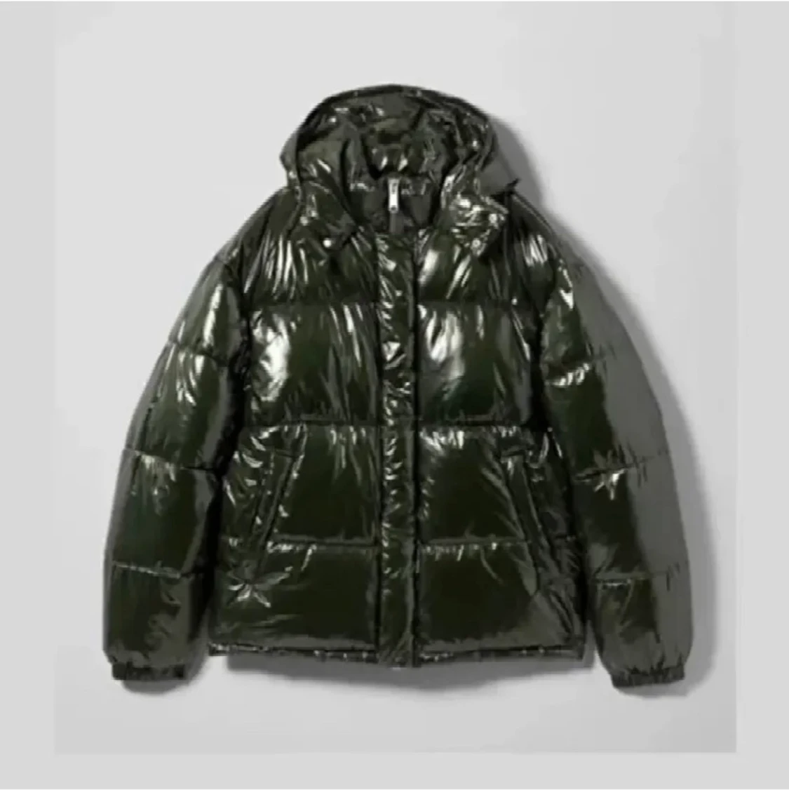 Glansig grön dunjacka