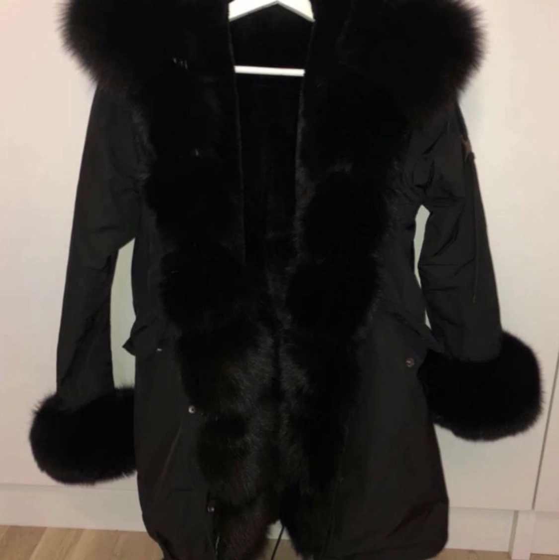 Svart vinterjacka storlek L