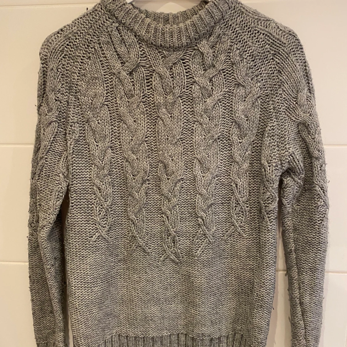 Stickad tröja
