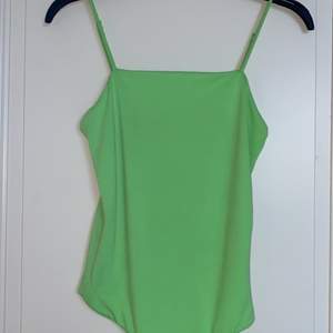 En neon grön body från Gina tricot! Högsbudande vinner! 🤩