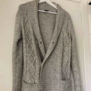  - Grey cardigan