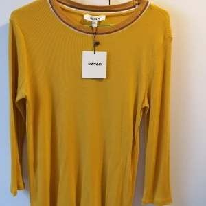 Oanvänd top - Helt ny topp