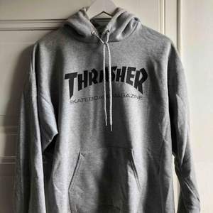 Sparsamt använd Thrasher hoodie i grå Kom med bud